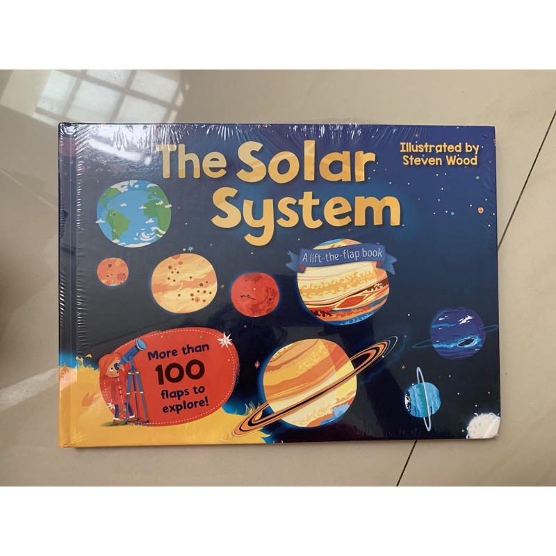 A lift the flap book - The Solar System