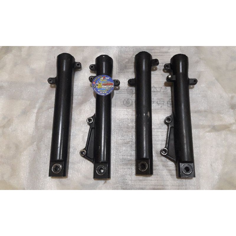 Bottom shock depan set kanan kiri tiger revo original copotan motor