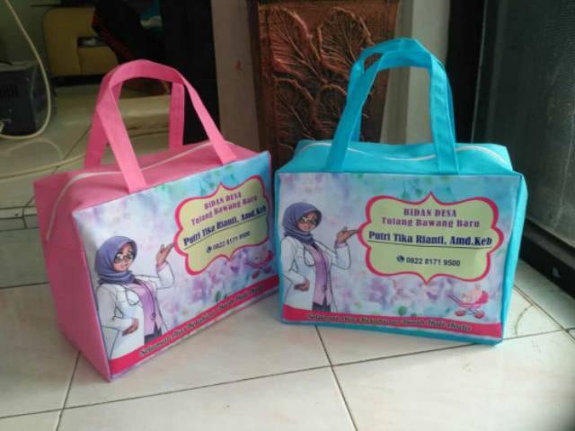 

tas souvenir praktek bidan model resleting custom