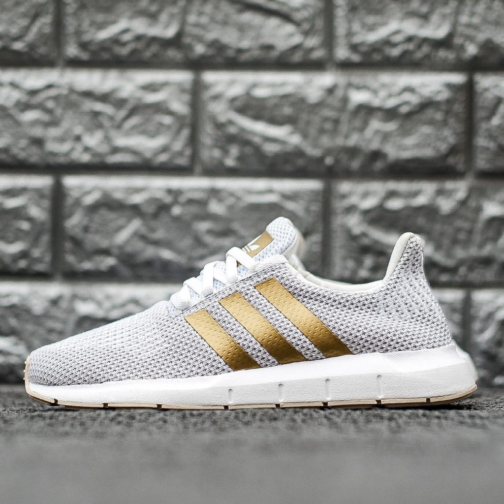 white and gold adidas swift run