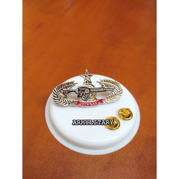 Pin hirbak 1