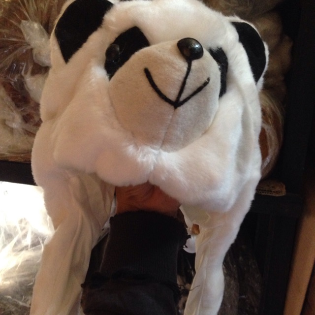 Topi boneka muka hewan