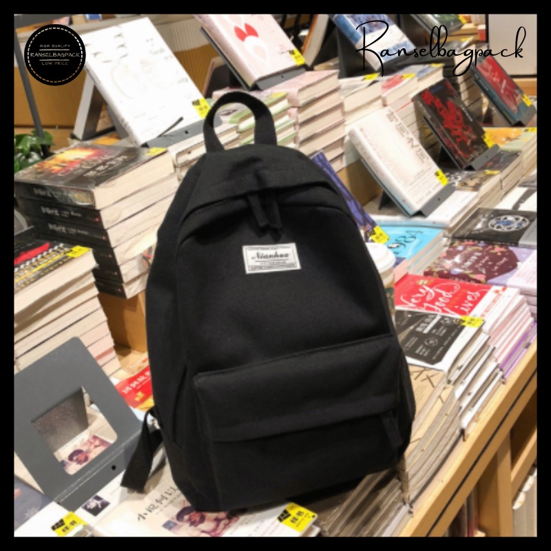 Tas Ransel Backpack Punggung Pria Wanita Sekolah Distro Polos Murah Terbaru Cewek Cowok Pria Wanita-Hitam Lebel