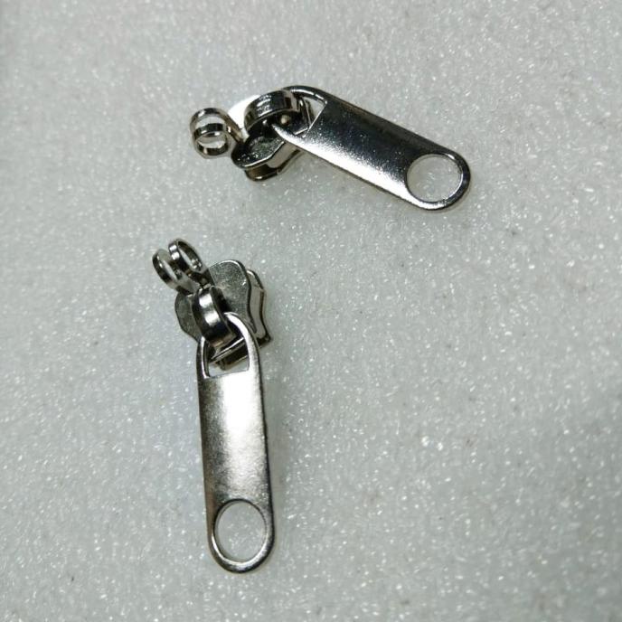 kepala resleting no.8 Tanduk kunci. warna putih (100 pcs).