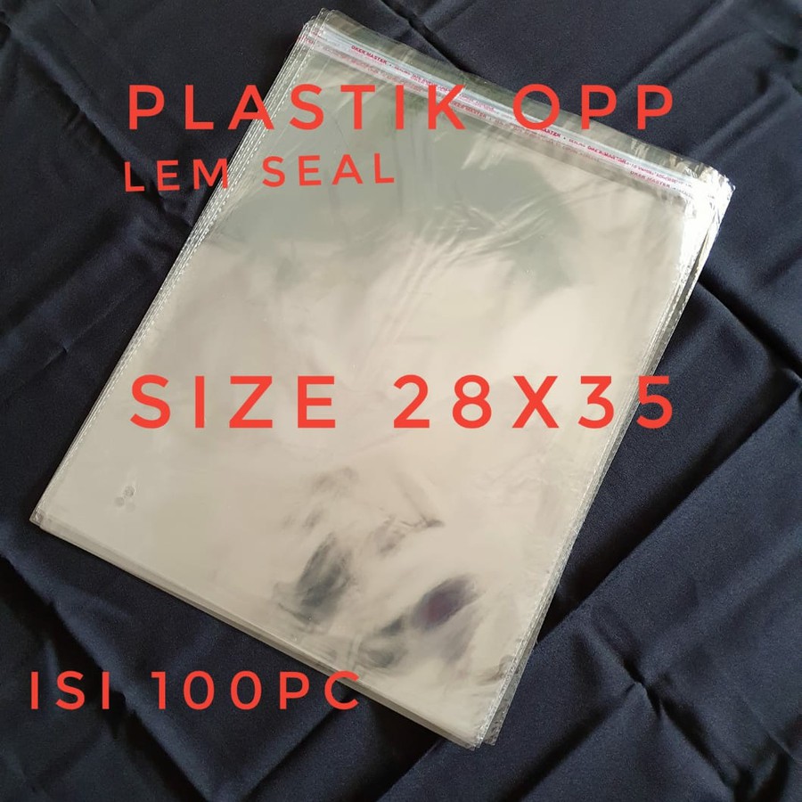 (ISI 100) OPP LEM 28X35 KEMASAN PACKING BAJU PLASTIK BENING SEAL