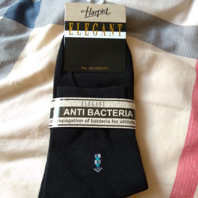 kaos kaki pria pendek harpist atas mata kaki