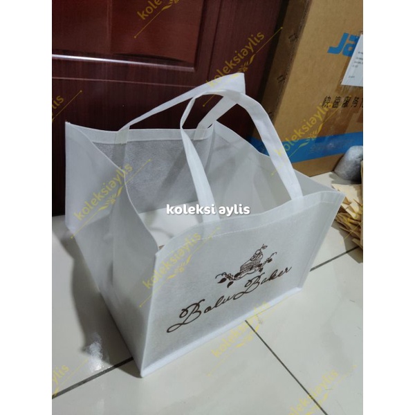 

PO 50GSM 303020 Tas Dus Kue +sablon