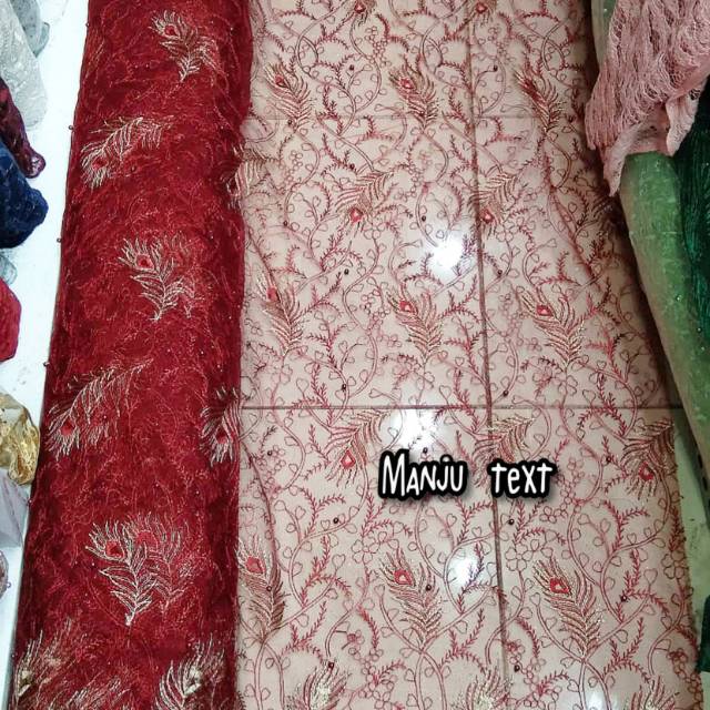 Kain -bahan tile mutiara motif bulu merak/cocok untuk gaun,dress atasan kebaya,seragaman,dll terbaru