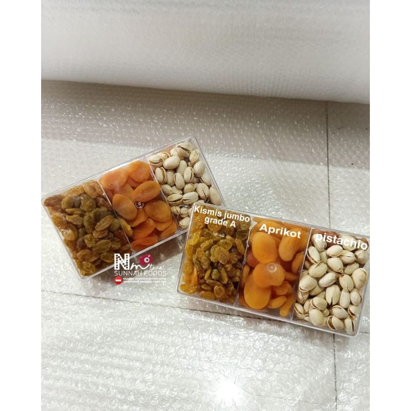 

Hampers Idul Fitri sekat tiga (kismis jumbo, pistachio, aprikot)