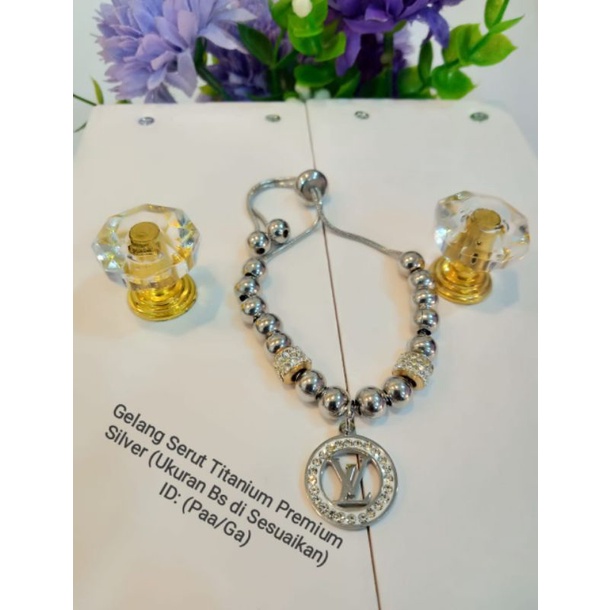 Gelang serut titanium silver jurai