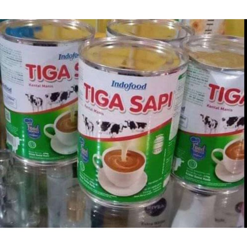 

Tiga sapi susu kental manis - 490gr ( kaleng besar )