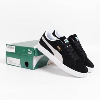 black white puma trainers