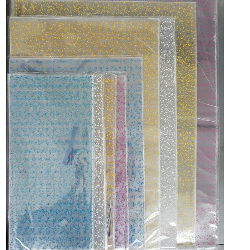 

SALE!! KODE-234 Plastik ultah / plastik souvenir Opp pembungkus makanan uk: 32 x 50 + Pita isi 12 Pc