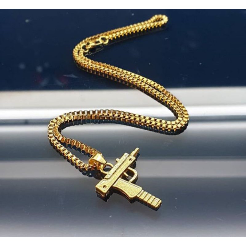 kalung uzi titanium import pandant