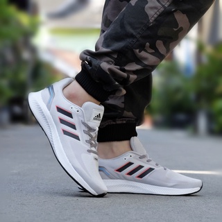 white and gold adidas running shoes