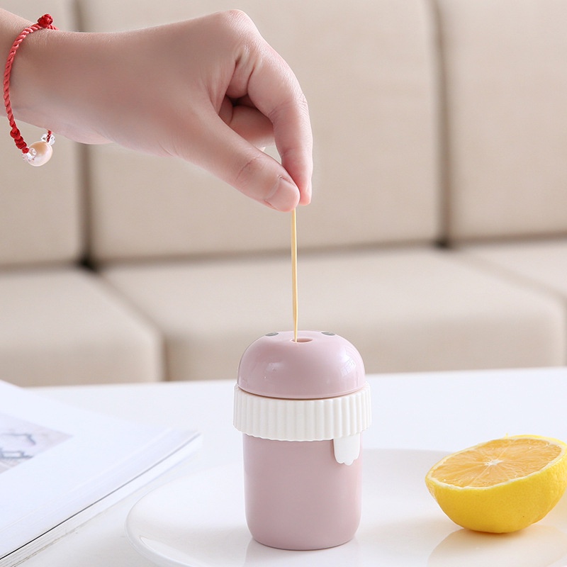 Botol Penyimpanan Tusuk Gigi Portabel Tahan Debu Motif Kartun Ukuran 5x8cm Untuk Ruang Makan