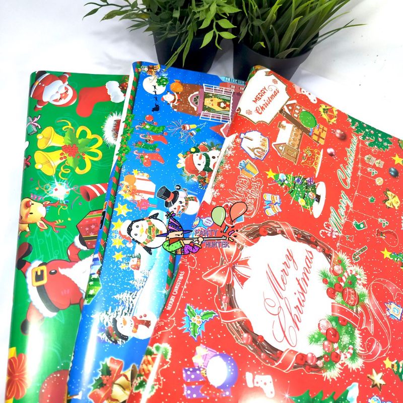 

(MIN 10 PCS BLH CAMPUR) KERTAS KADO GLOSSY MOTIF NATAL CHRISTMAS SANTA CLAUS