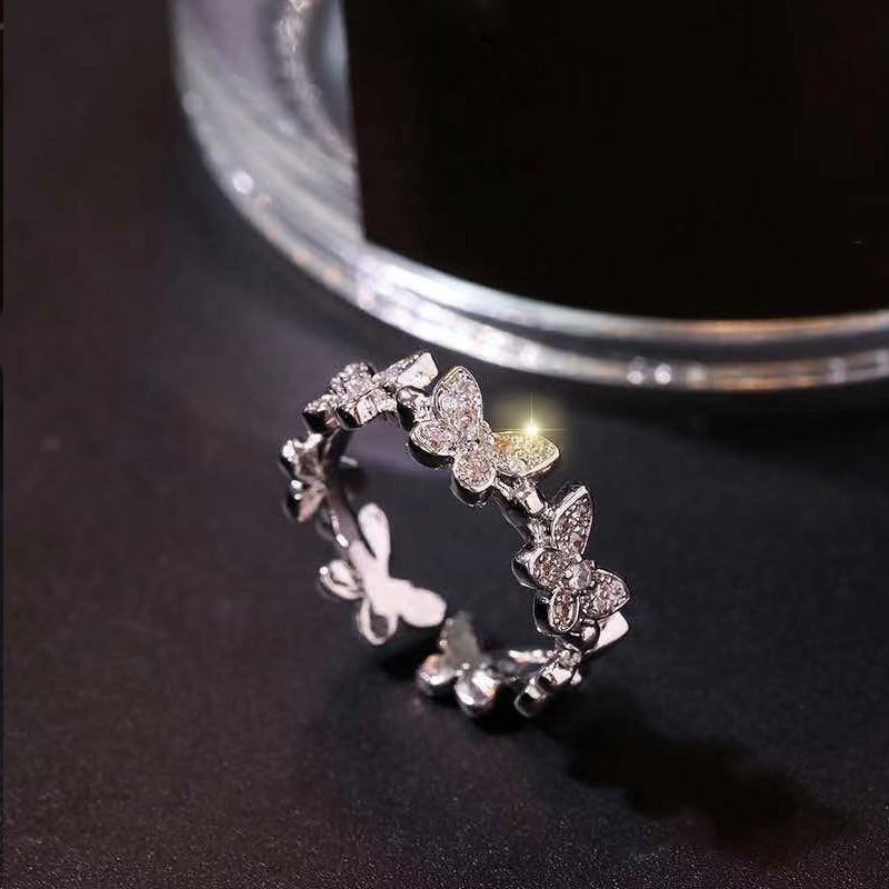 Cincin Adjustable Desain Kupu-Kupu Bahan Zircon Warna Silver Gaya Korea Untuk Wanita