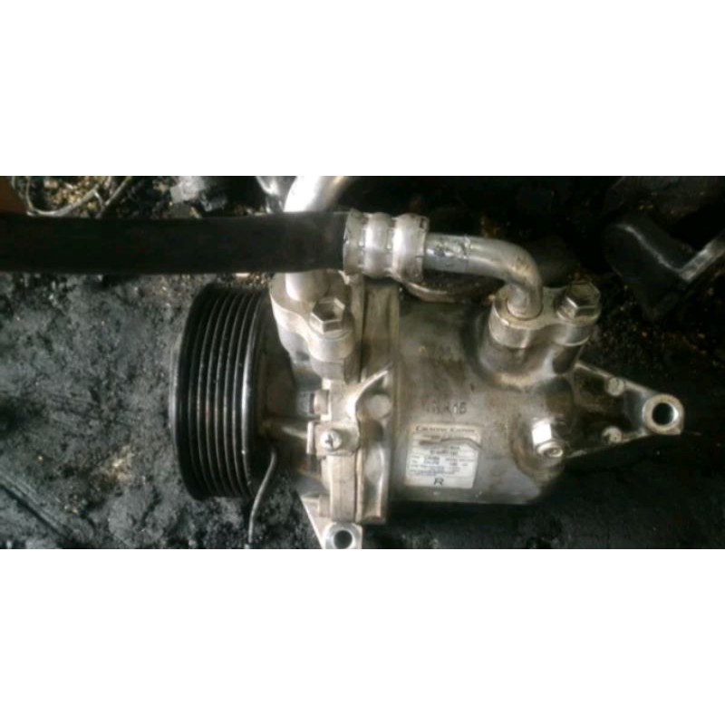 kompresor AC grand livina