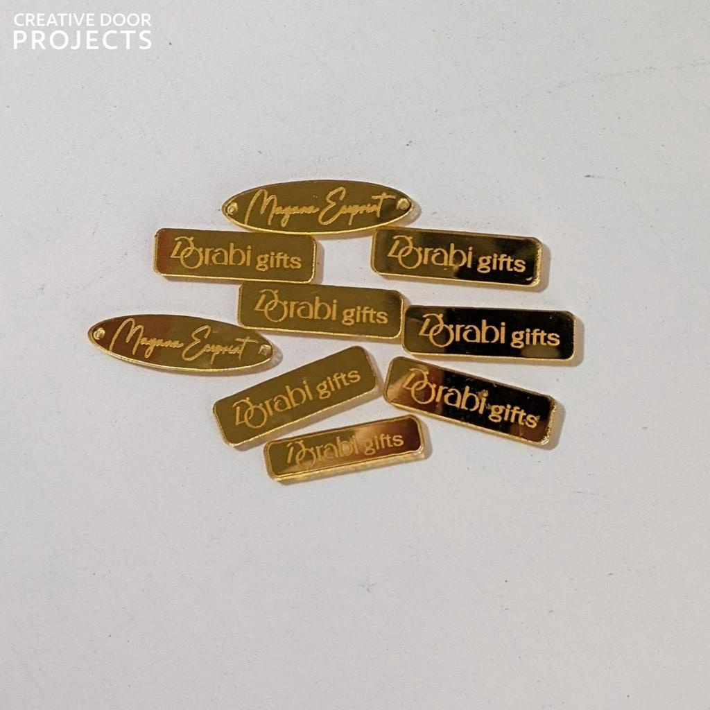 

Label Akrilik Mirror Gold/ Akrilik bening/ Gravoply/ MDF/ Plywood | Label Baju | Label Hijab | Label Produk