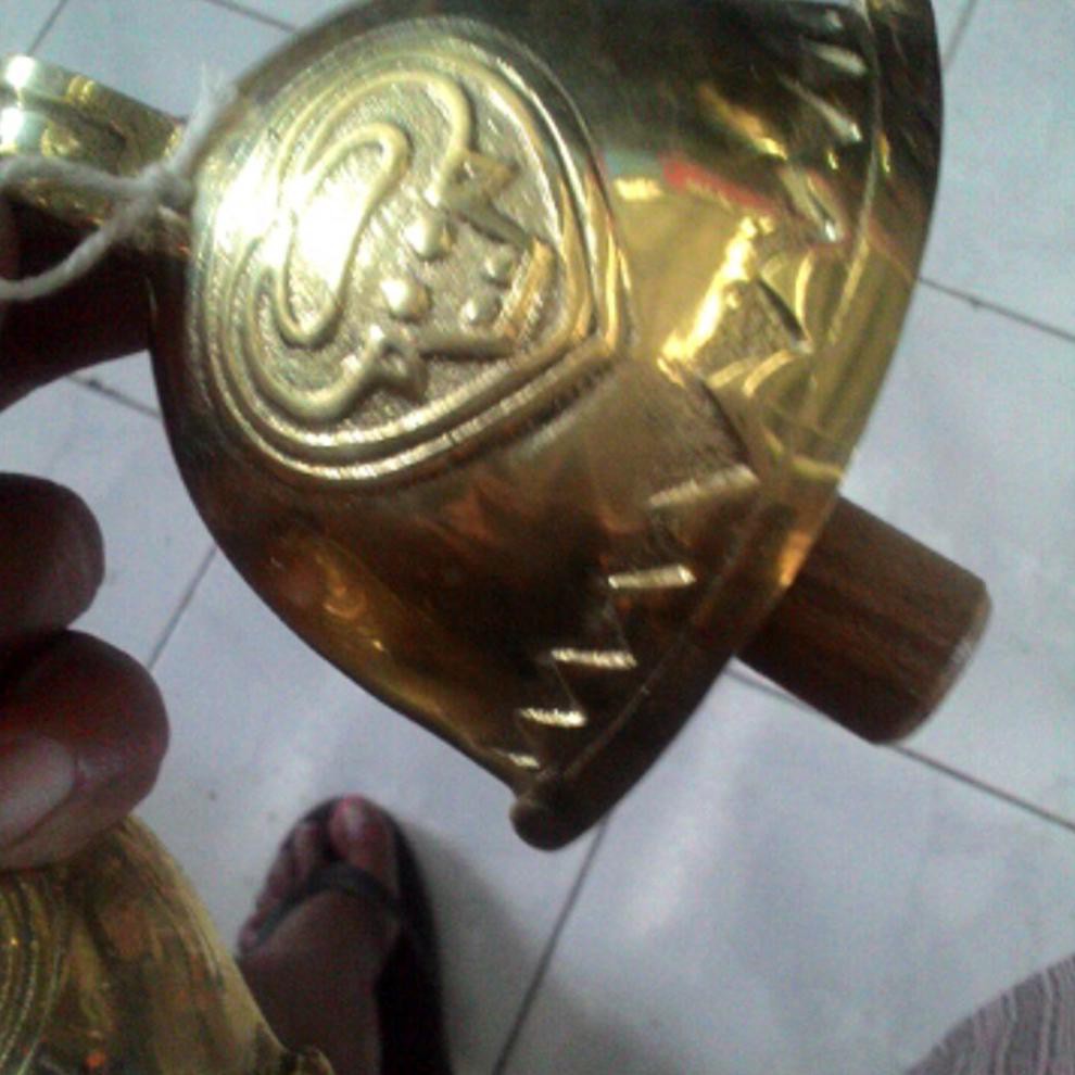 lonceng sapi kuningan