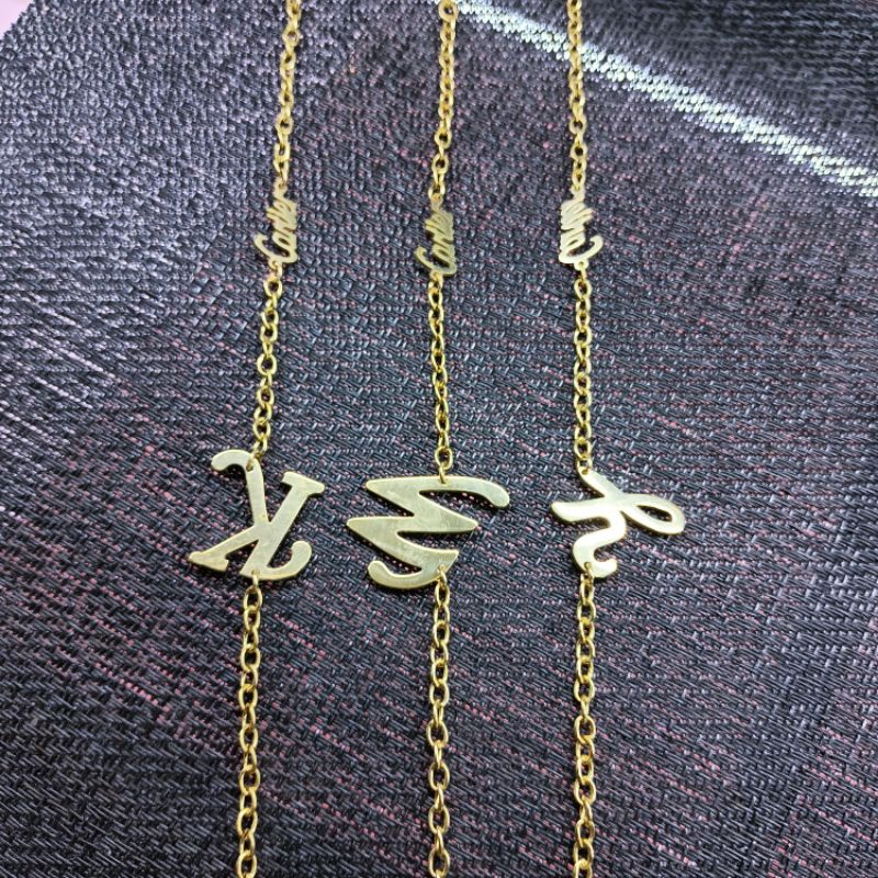 Gelang Huruf Titanium