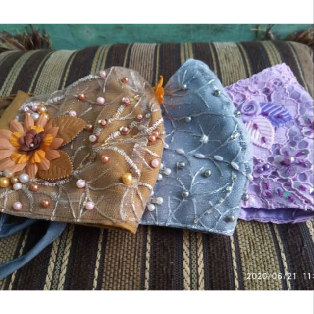 Masker brokat mutiara mewah
