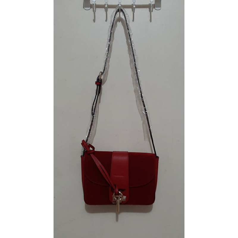 Tas Merah Yongki Komaladi