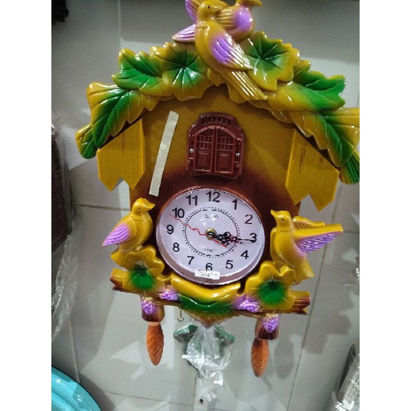 jam dinding kikuk merek esa