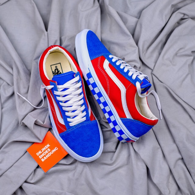 blue and red old skool vans