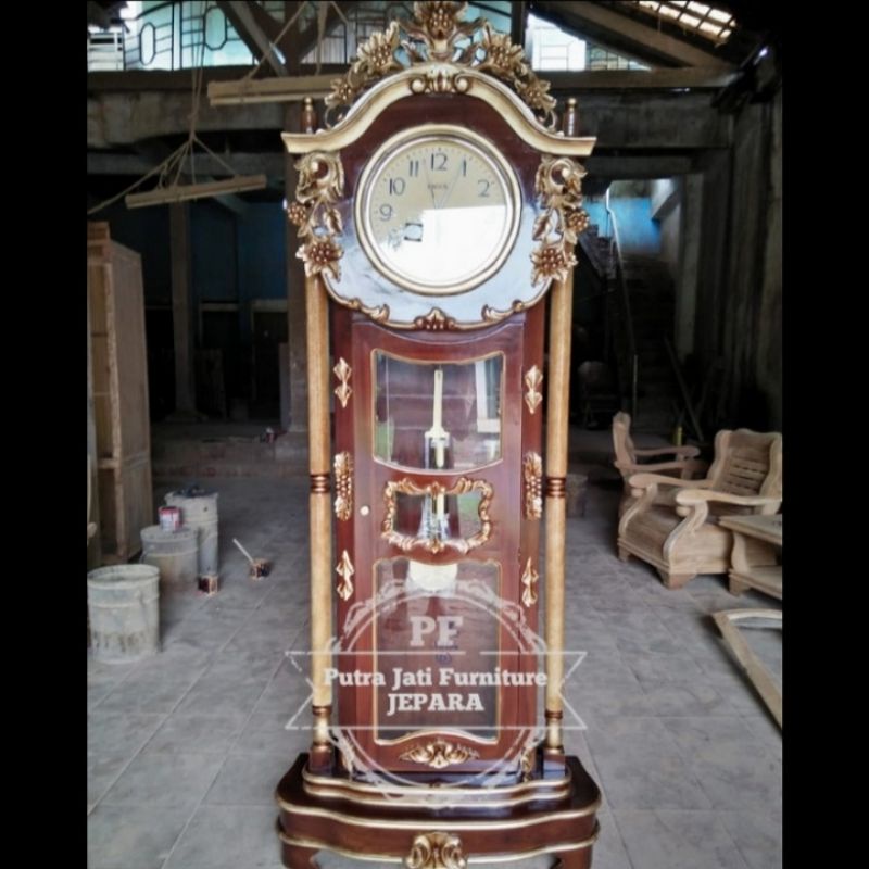Jam hias masjid ukir Jepara - Lemari jam berdiri mebel Jepara