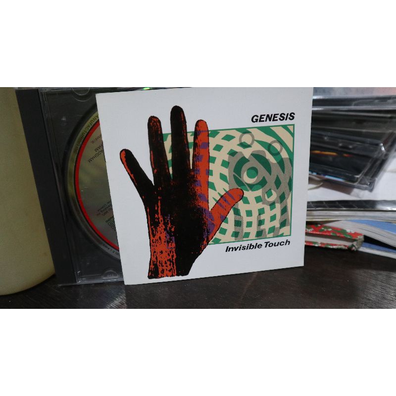 cd genesis invicible touch