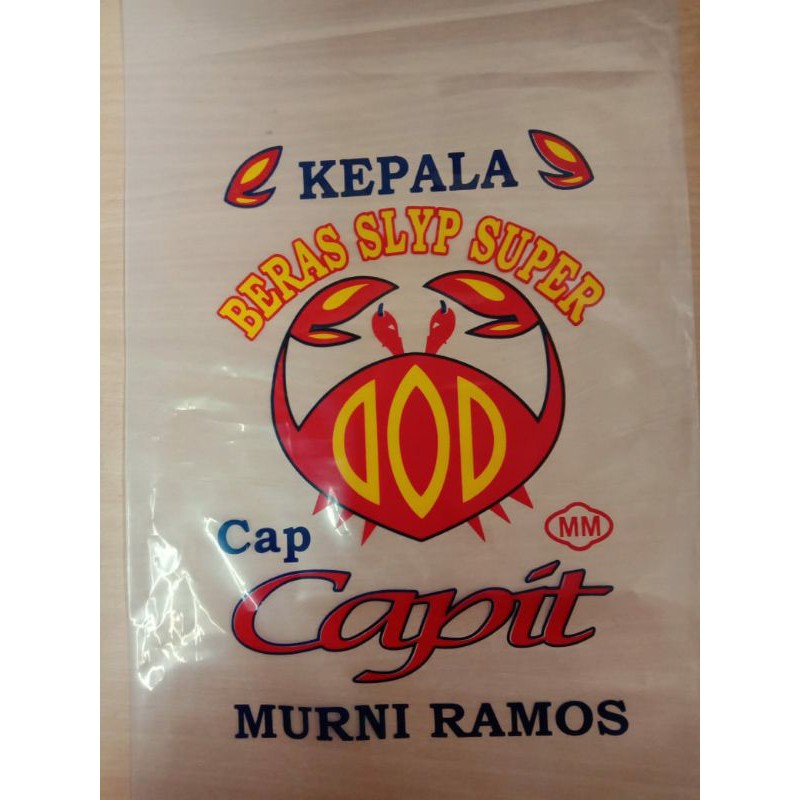 

kemasan beras/plastik beras 5 kg cap capit(ini kemasan bukan beras )