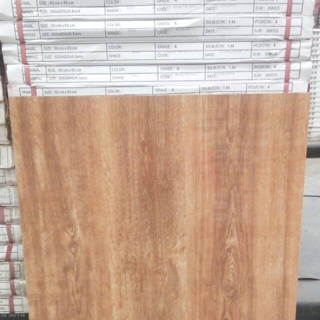  Granit  glossy  motif  serat kayu  coklat 60x60 perdus merk 