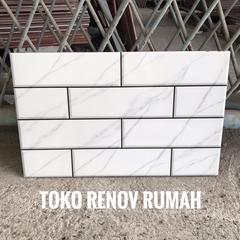 Jual keramik dinding 25x40 bata putih motif carara (mengkilap
