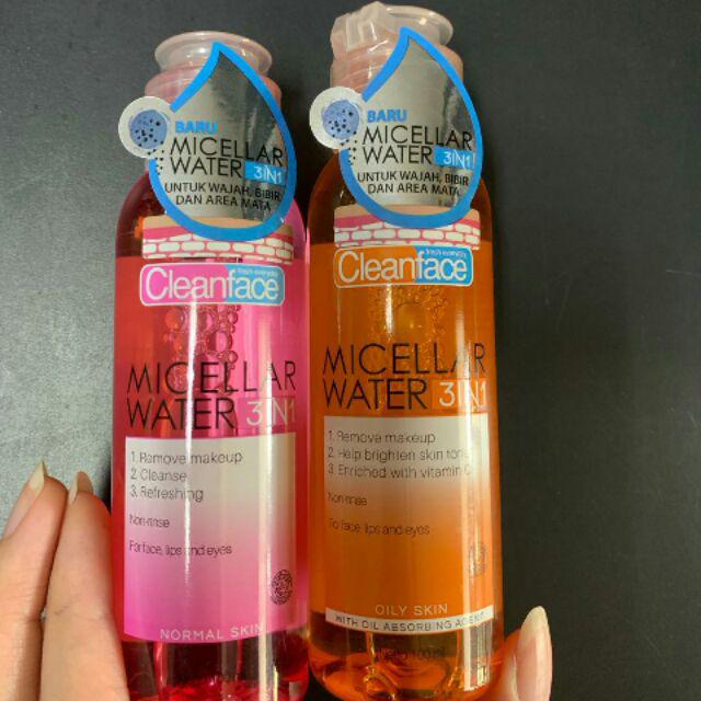 cleaning face with micellar water