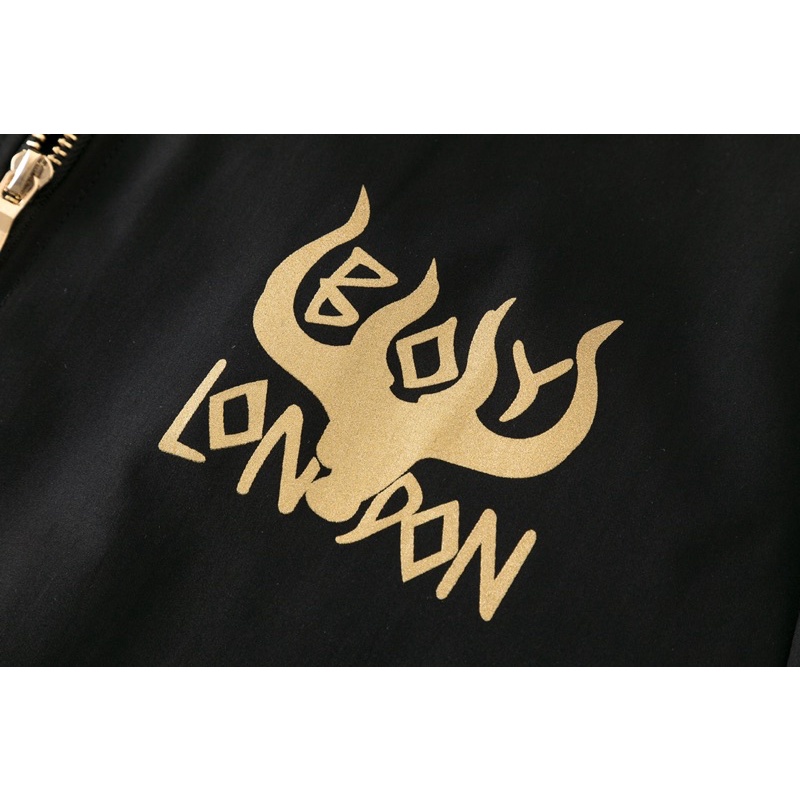 BOY32 JAKET ZIPPER BOY LONDON IMPORT GOLD ON BLACK PRIA WANITA INGGRIS