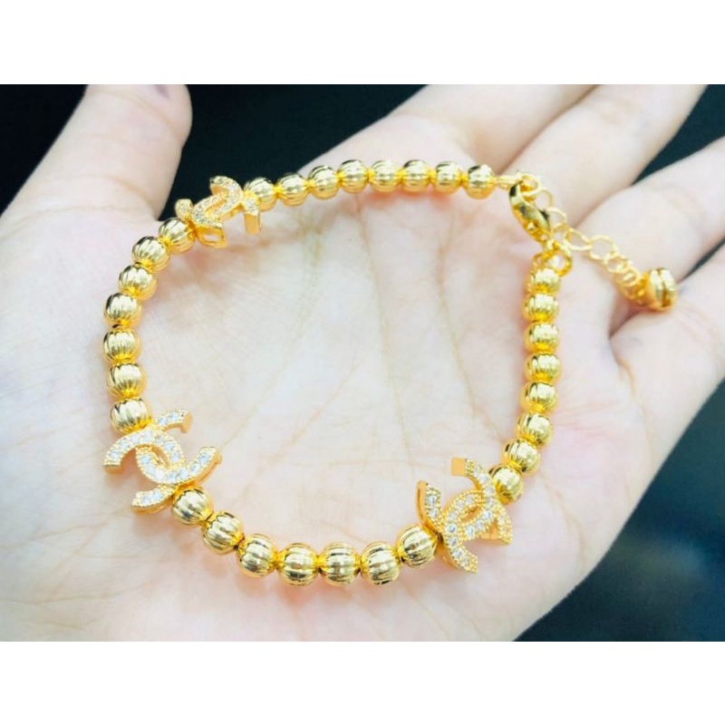 Gelang tangan xuping wanita berlapis emas dengan mata zircon.