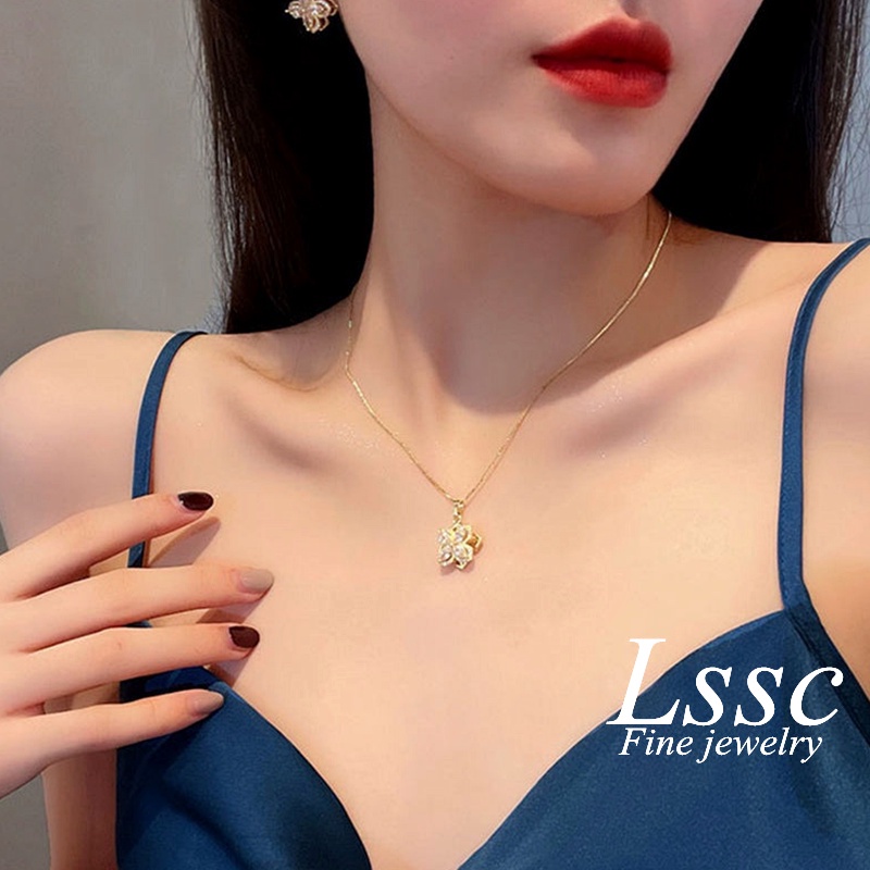 Kalung Titanium Semanggi Beruntung Berputar Bunga Berlian Mewah Emas 18K Anti Karat Perhiasan Wanita