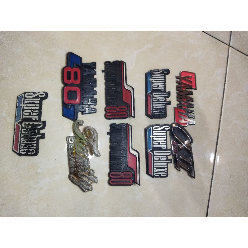 logo sayap v75 v80 famili robot v79