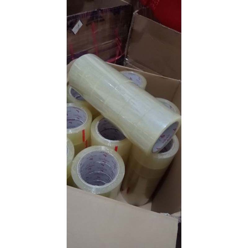 

lakban bening kualitas daimaru roll isi 100 yard 2 inch 48mm 1 roll 6pcs harga per pcs /biji solatip