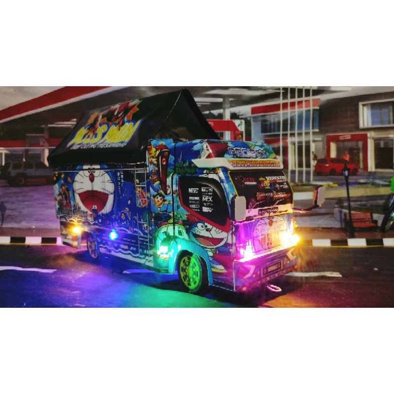 miniatur truk oleng Doraemon ukuran panjang 42cm full lampu bonus terpl