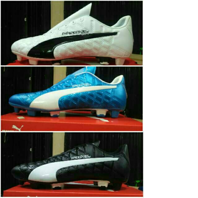 Sepatu bola komponen ory puma putih list hitam