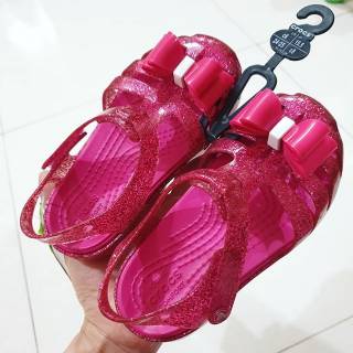 pink and purple crocs