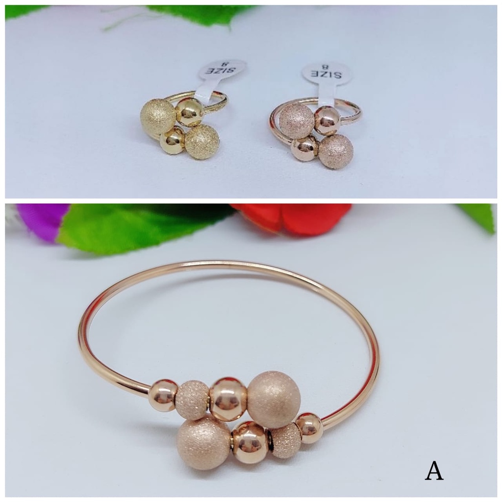 Titanium gelang dan cincin biji bola A.B