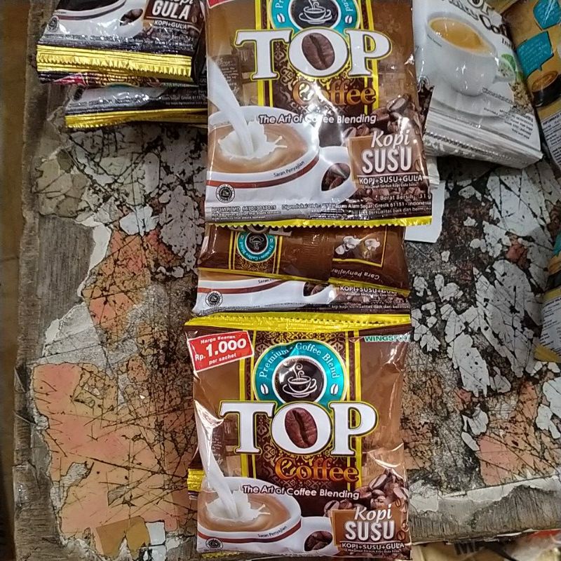 Top coffee susu 31g,per renteng (12sachet).