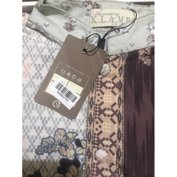 WEARING KLAMBY KENANGA TUNIC FROM  ULOS SERIES