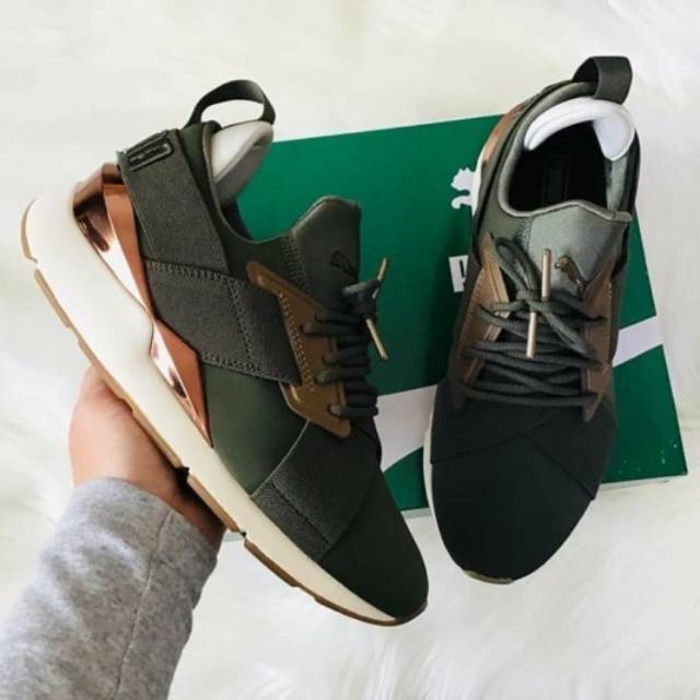 olive green and gold pumas