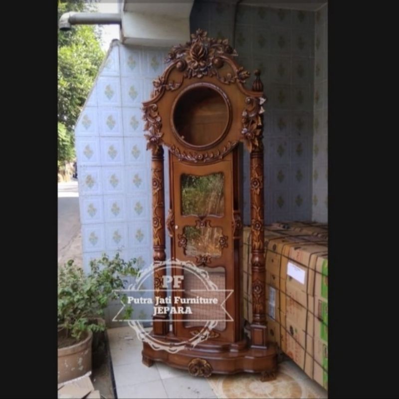 Jam besar hias masjid bahan kayu jati ukir Jepara