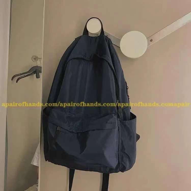 ۩∋Sera Chuanjiu Ling Liontin Perasaan Ringan Nilon Ransel Olahraga Unisex Pemuda Ransel Pria dan Wanita Mahasiswa Tas Sekolah Komputer Tas